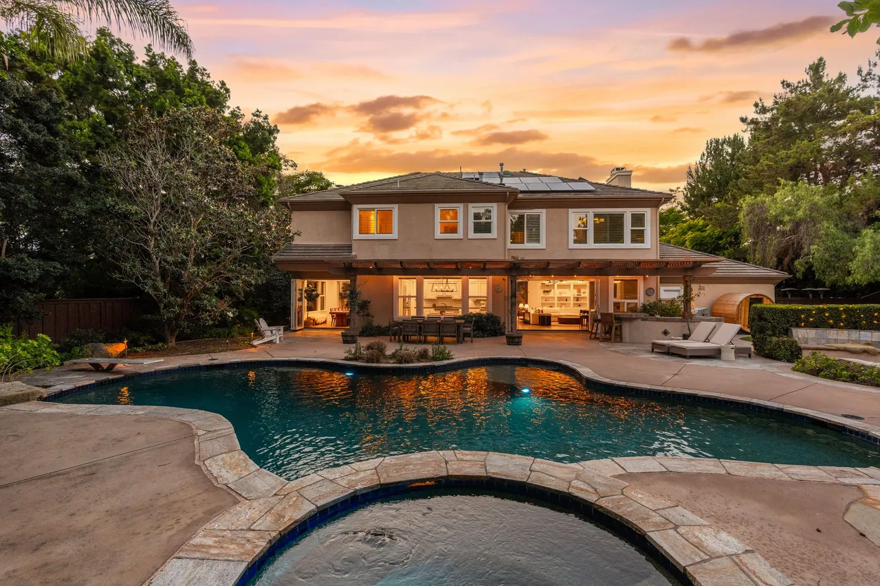 Pool and home at sunset