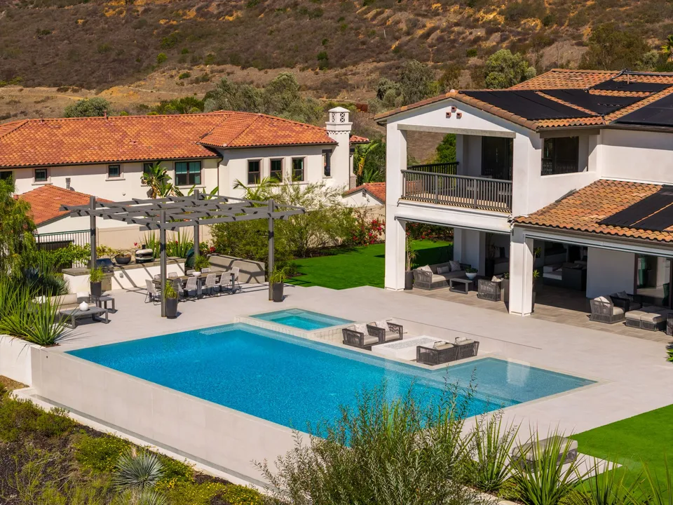 Aerial photo of the pool and rear yard